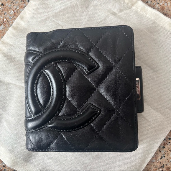 CHANEL Handbags - CHANEL Black Quilted Kisslock Leather Wallet